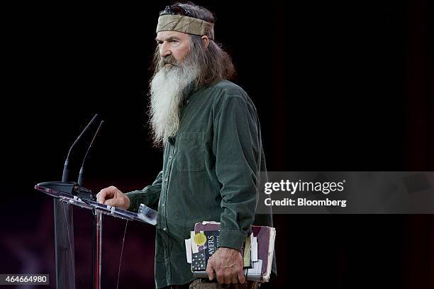 Phil Robertson, TV personality from A&E Television Networks LLC's Duck Dynasty show, speaks during the Conservative Political Action Conference in...