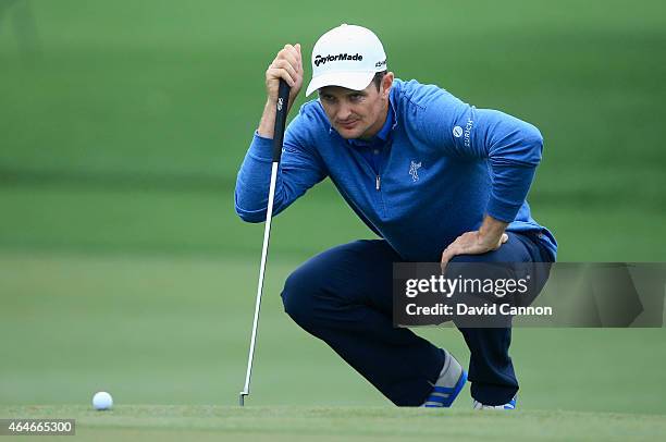 Justin Rose of England lines up a putt on the fourth green during the second round of The Honda Classic at PGA National Resort & Spa - Champion...