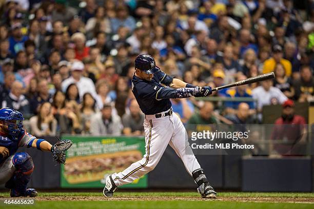 Jonathan Lucroy of the Milwaukee Brewers breaks a Major League Baseball record by hitting his 46th double in a single season as a catcher during the...