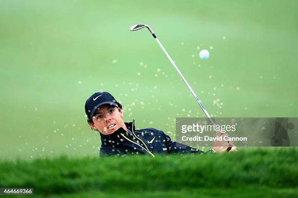 Rory McIlroy of Northern Ireland plays his shot out of a bunker on the fourth hole during the second round of The Honda Classic at PGA National...