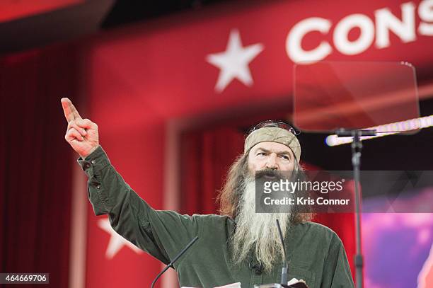 Phil Robertson of A&E's Duck Dynasty addresses the 42nd annual Conservative Political Action Conference at the Gaylord National Resort Hotel and...