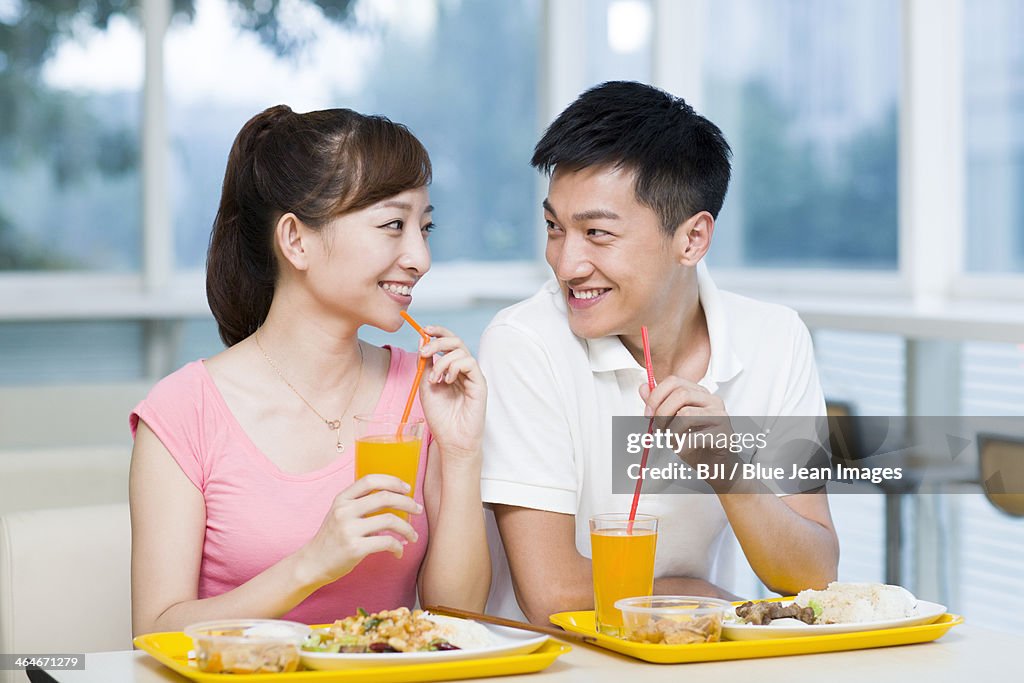 Young couple having a meal in restaurant