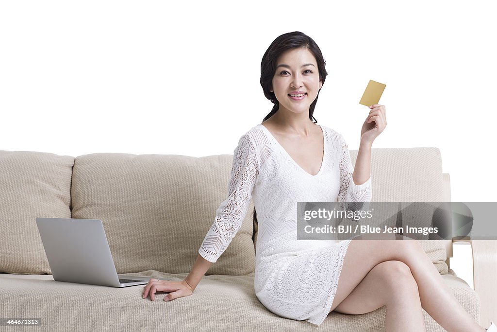 Young woman doing online shopping