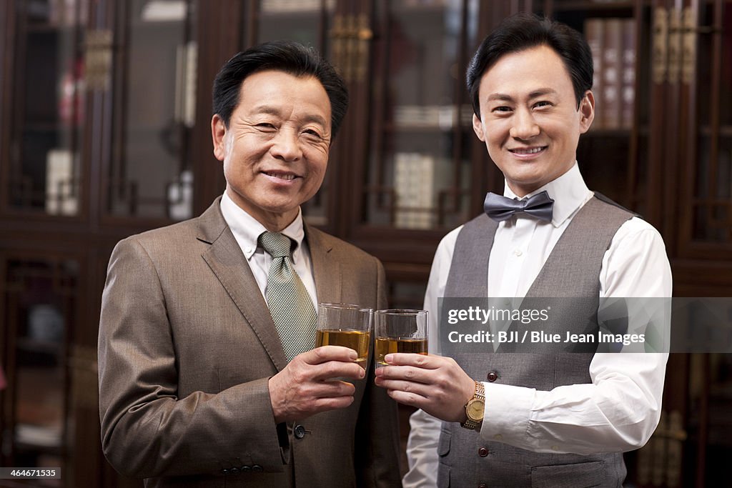 Businessmen toasting