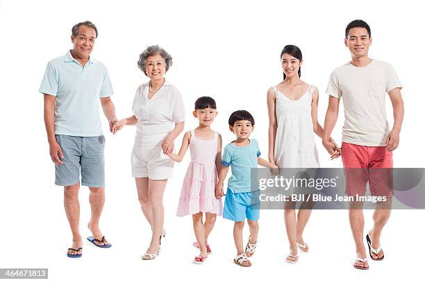 happy family holding hands - grootmoeder witte achtergrond stockfoto's en -beelden