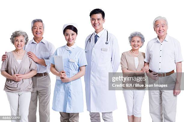 hospital staff with senior couples - nurse hat stock pictures, royalty-free photos & images