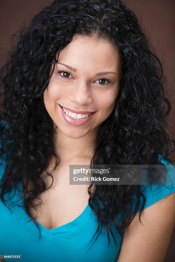 Mixed race woman smiling