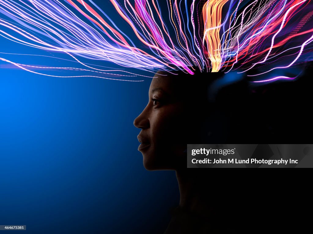 Light trails coming from African American's head