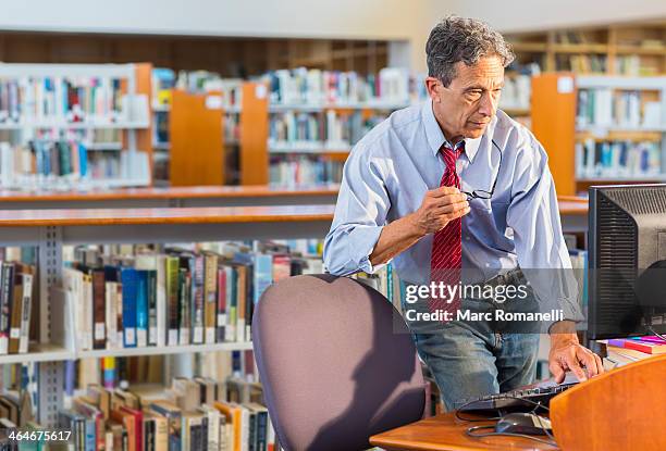 Person Using Computer At A Library 2,563 Public Library Computer Stock Photos, High-Res Pictures, and ...