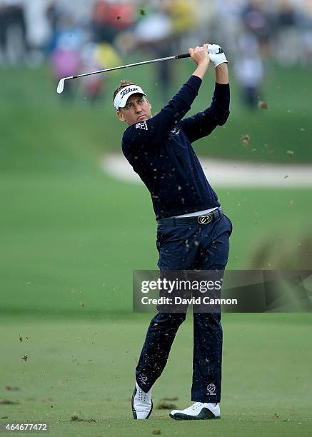 Ian Poulter of England plays his second shot on the par 4, first hole during the second round of The Honda Classic on the Champions Course at the PGA...