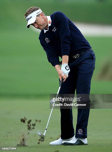 Ian Poulter of England plays his second shot on the par 4, first hole during the second round of The Honda Classic on the Champions Course at the PGA...