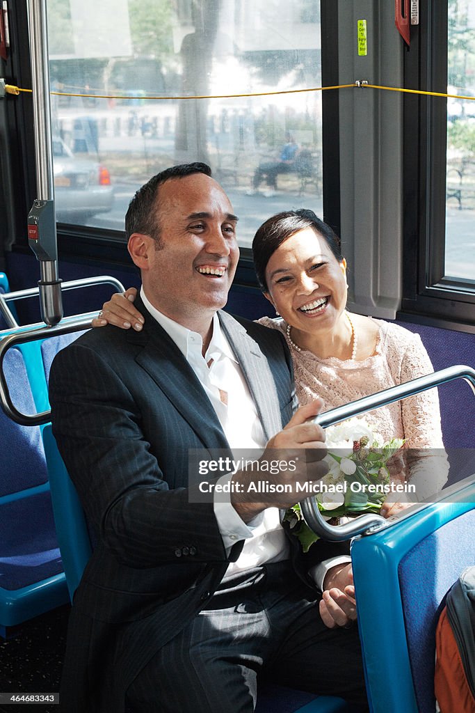 Couple on a city bus "just married"