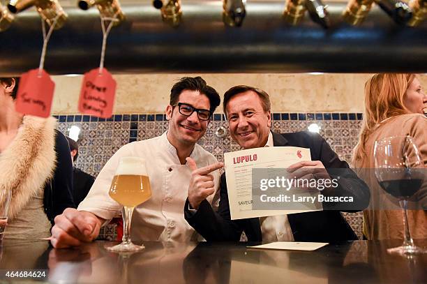 Chef George Mendes and Chef Daniel Boulud attend a celebration of The New SAVEUR at Chef George Mendes' soon-to-be opened Lupulo Restaurant on...