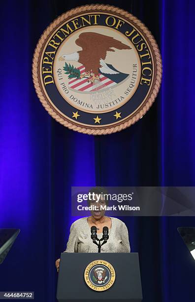 Aretha Franklin sings America The Beauiful during a portrait unveiling ceremony for outgoing Attorney General Eric Holder at the Justice Department...