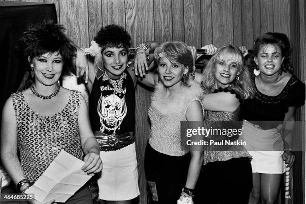 Portrait of the music group the Go-Go's as they pose backstage at an unspecified venue, Chicago, Illinois, July 30, 1981. Pictured are, from left,...