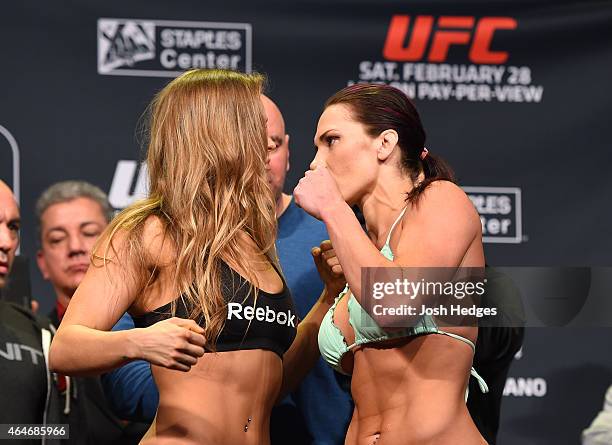 Opponents Ronda Rousey and Cat Zingano face off during the UFC 184 weigh-in at the Event Deck and LA Live on February 27, 2015 in Los Angeles,...