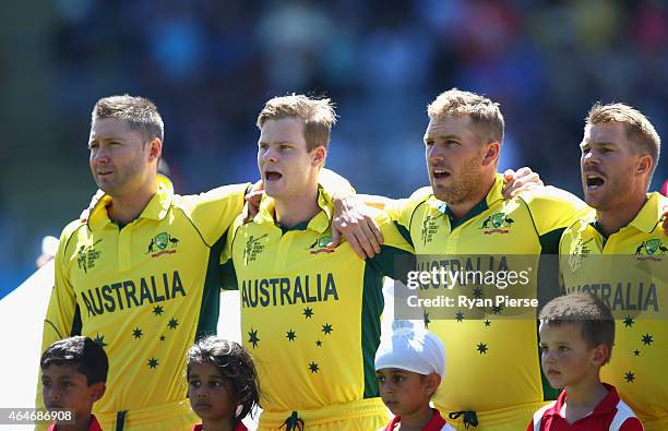 Michael Clarke, Steve Smith, Aaron Finch and David Warner of Australia , sing the national anthem during the 2015 ICC Cricket World Cup match between...