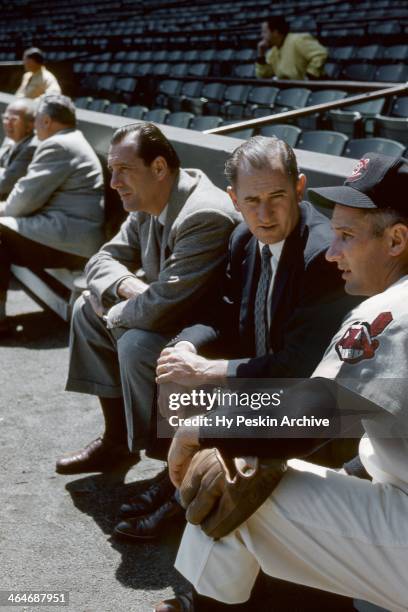 General Manager Hank Greenberg and Al Rosen of the Cleveland Indians talk with an unidentified man before an MLB game against the Chicago White Sox...