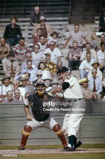 Al Rosen and catching coach Bill Lobe of the Cleveland Indians take batting practice during spring training on March 7, 1955 in Tuscon, Arizona.