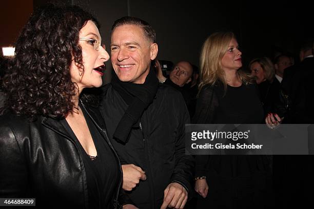 Tina Mueller and Bryan Adams attend the presentation and vernissage of the calender "THE ADAM BY BRYAN ADAMS" for Opel at Haus der Kunst on January...