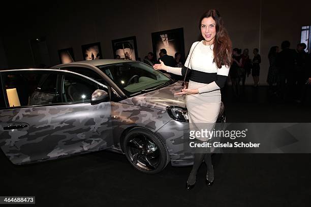 Alexandra Polzin attends the presentation and vernissage of the calender "THE ADAM BY BRYAN ADAMS" for Opel at Haus der Kunst on January 23, 2014 in...
