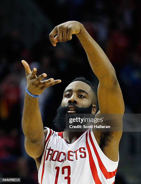 James Harden of the Houston Rockets celebrates a basket during their game against the Brooklyn Nets at the Toyota Center on February 27, 2015 in...