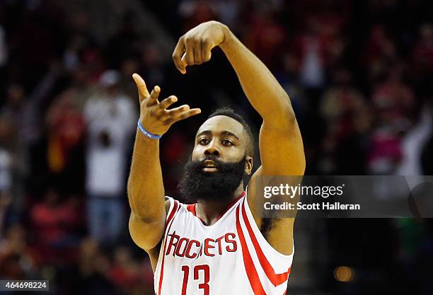 James Harden of the Houston Rockets celebrates a basket during their game against the Brooklyn Nets at the Toyota Center on February 27, 2015 in...