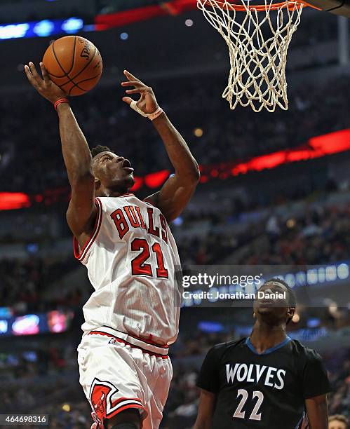 Jimmy Butler of the Chicago Bulls puts up a shot over Andrew Wiggins of the Minnesota Timberwolves on his way to a game-high 28 points at the United...