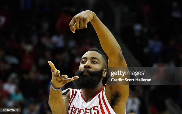 James Harden of the Houston Rockets celebrates a basket during their game against the Brooklyn Nets at the Toyota Center on February 27, 2015 in...