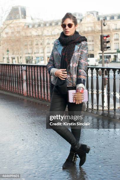 Senior editor for Style.com Arabia, Sofia Guellaty wears Toga Pulla boots, BLK DNM jeans, Suno jacket, Ralph Lauren sunglasses, Chinti and Parker...