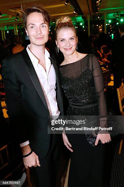 Fashion Designer Maxime Simoens and actress Melanie Laurent attend the Sidaction Gala Dinner 2014 at Pavillon d'Armenonville on January 23, 2014 in...