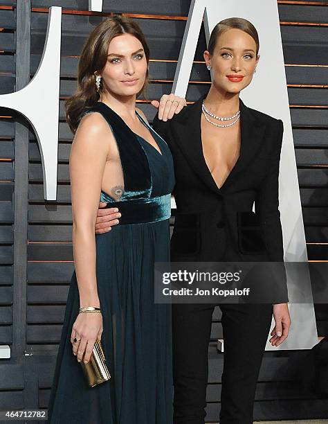 Models Alyssa Miller and Hannah Davis arrive at the 2015 Vanity Fair Oscar Party Hosted By Graydon Carter at Wallis Annenberg Center for the...