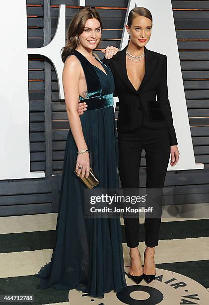 Models Alyssa Miller and Hannah Davis arrive at the 2015 Vanity Fair Oscar Party Hosted By Graydon Carter at Wallis Annenberg Center for the...