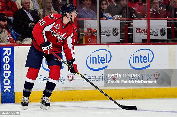 Cameron Schilling of the Washington Capitals controls the puck in the third period during an NHL game against the Pittsburgh Penguins at Verizon...