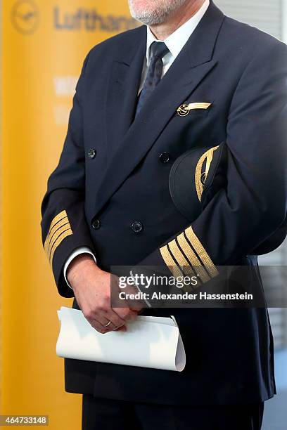 Lufthansa pilote wait during a presentation of the new plane by Airbus officials on February 27, 2015 in Munich, Germany. The A350 is a long-distance...