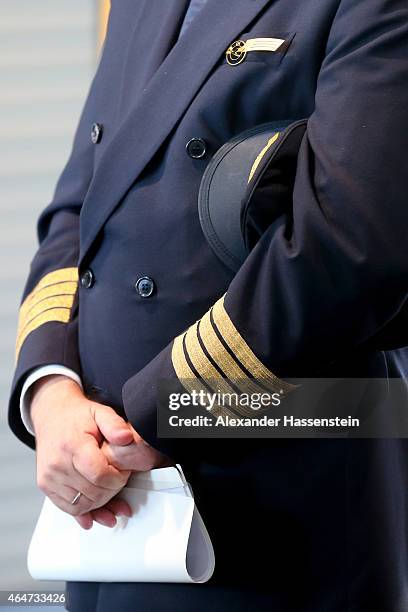 Lufthansa pilote wait during a presentation of the new plane by Airbus officials on February 27, 2015 in Munich, Germany. The A350 is a long-distance...