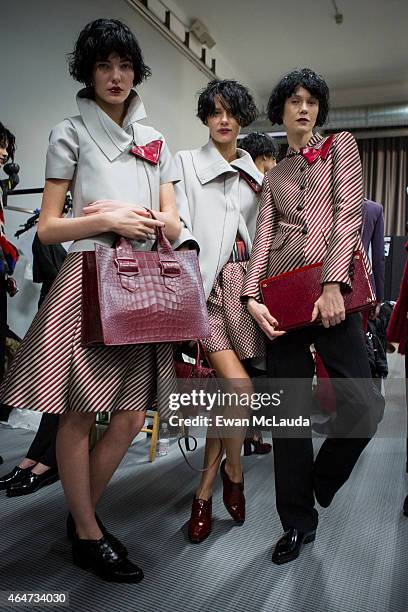 Models are seen backstage ahead of the Emporio Armani show during the Milan Fashion Week Autumn/Winter 2015 on February 27, 2015 in Milan, Italy.