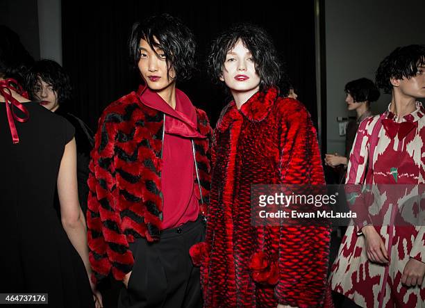 Models are seen backstage ahead of the Emporio Armani show during the Milan Fashion Week Autumn/Winter 2015 on February 27, 2015 in Milan, Italy.
