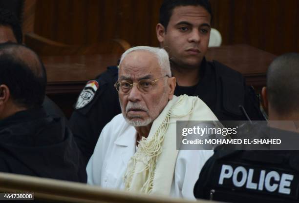 Egypt's former Muslim Brotherhood supreme guide Mohammed Mahdi Akef looks on during his trial at the non-commissioned police officers institute in...