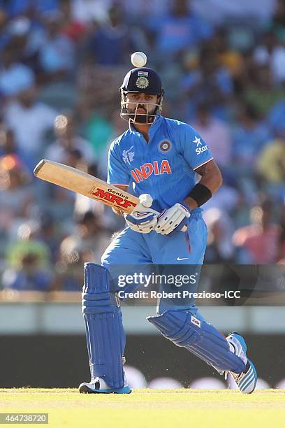 Virat Kohli of India plays a shot during the 2015 ICC Cricket World Cup match between India and the United Arab Emirates at WACA on February 28, 2015...