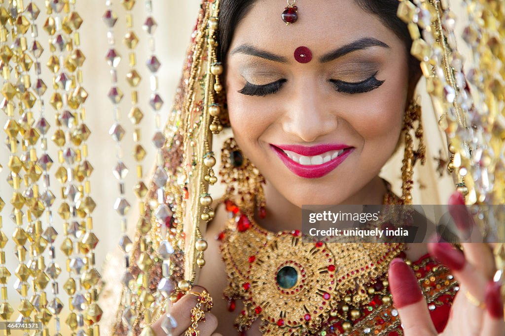 Beautiful Indian bride in traditional wedding dress