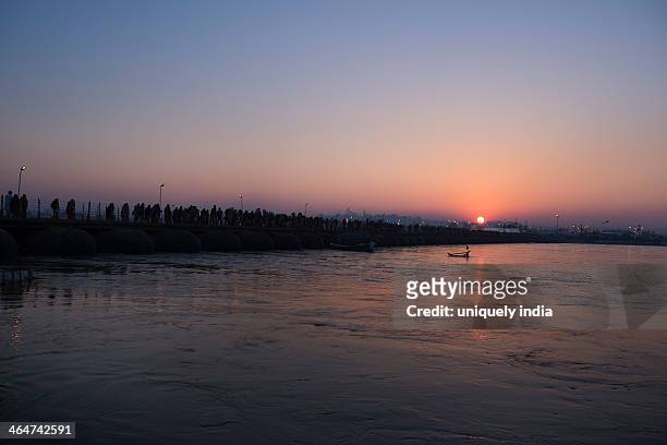 sunrise during maha kumbh, ganges river, allahabad, uttar pradesh, india - allahabad maha kumbh stock pictures, royalty-free photos & images