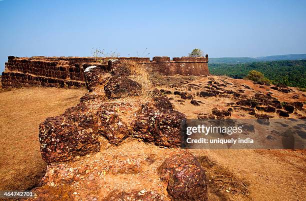 ruins of the fort, chapora fort, vagator beach, vagator, bardez, north goa, goa, india - chapora fort stock pictures, royalty-free photos & images