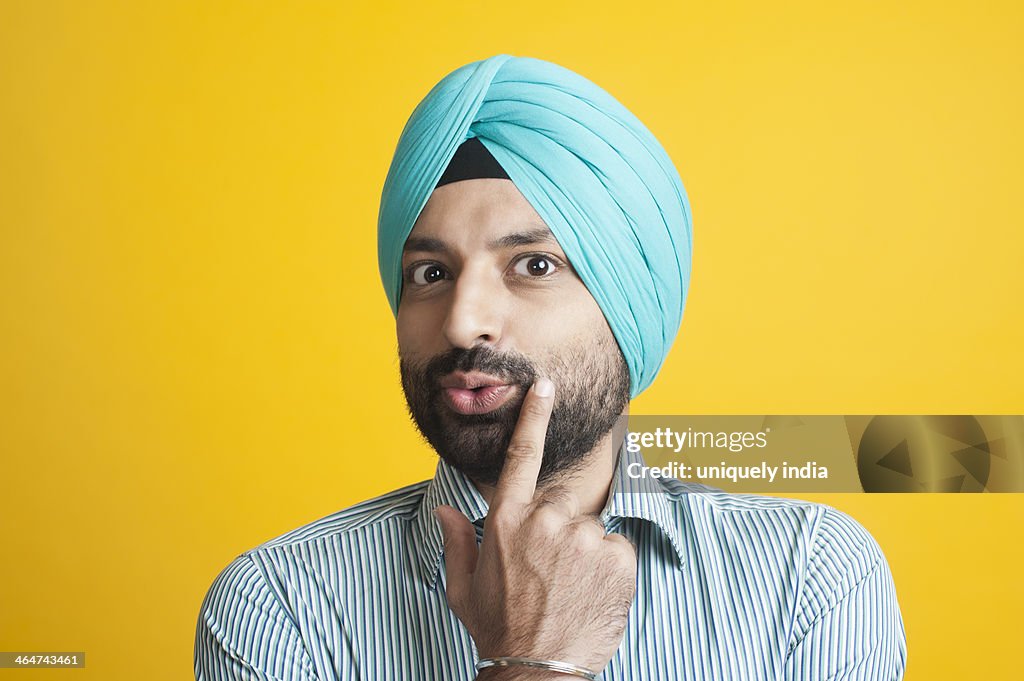 Portrait of a Sikh man gesturing