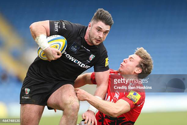 Eamonn Sheridan of London Irish is tackled by Will Robinson of London Welsh during the Aviva Premiership match between London Welsh and London Irish...