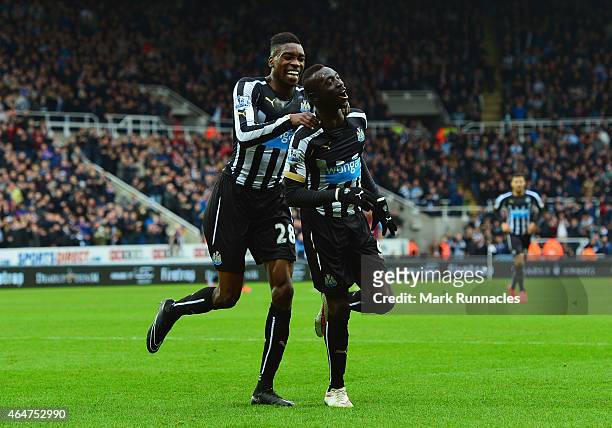 Papiss Demba Cisse of Newcastle United celebrates scoring the opening goal with Sammy Ameobi of Newcastle United during the Barclays Premier League...