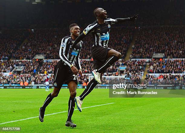 Papiss Demba Cisse of Newcastle United celebrates scoring the opening goal with Sammy Ameobi of Newcastle United during the Barclays Premier League...