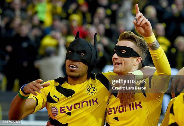 Pierre-Emerick Aubameyang of Borussia Dortmund celebrates with Marco Reus of Borussia Dortmund after scoring his teams first goal during hte...