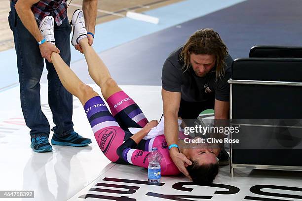 Dame Sarah Storey receives treatment after her Women's Hour Record attempt at the Lee Valley Velodrome on February 28, 2015 in London, England.