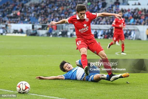 Jairo Samperio of Mainz is challenged by Jin-Su Kim of Hoffenheim during the Bundesliga match between 1899 Hoffenheim and 1. FSV Mainz 05 at Wirsol...